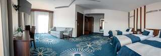 Курортные отели Kasor Resort & Spa Стрыкув Стандартный трехместный номер-студио-1