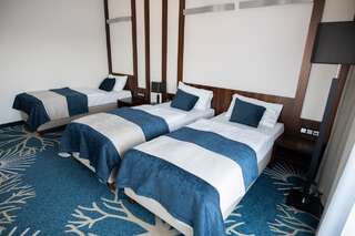 Курортные отели Kasor Resort & Spa Стрыкув Стандартный трехместный номер-студио-3