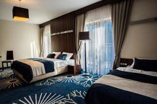 Курортные отели Kasor Resort & Spa Стрыкув Трехместный номер Делюкс-3