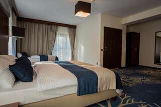 Курортные отели Kasor Resort & Spa Стрыкув Трехместный номер Делюкс-4